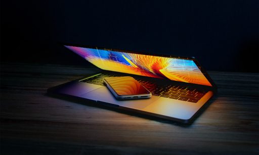 Laptop on table in the dark